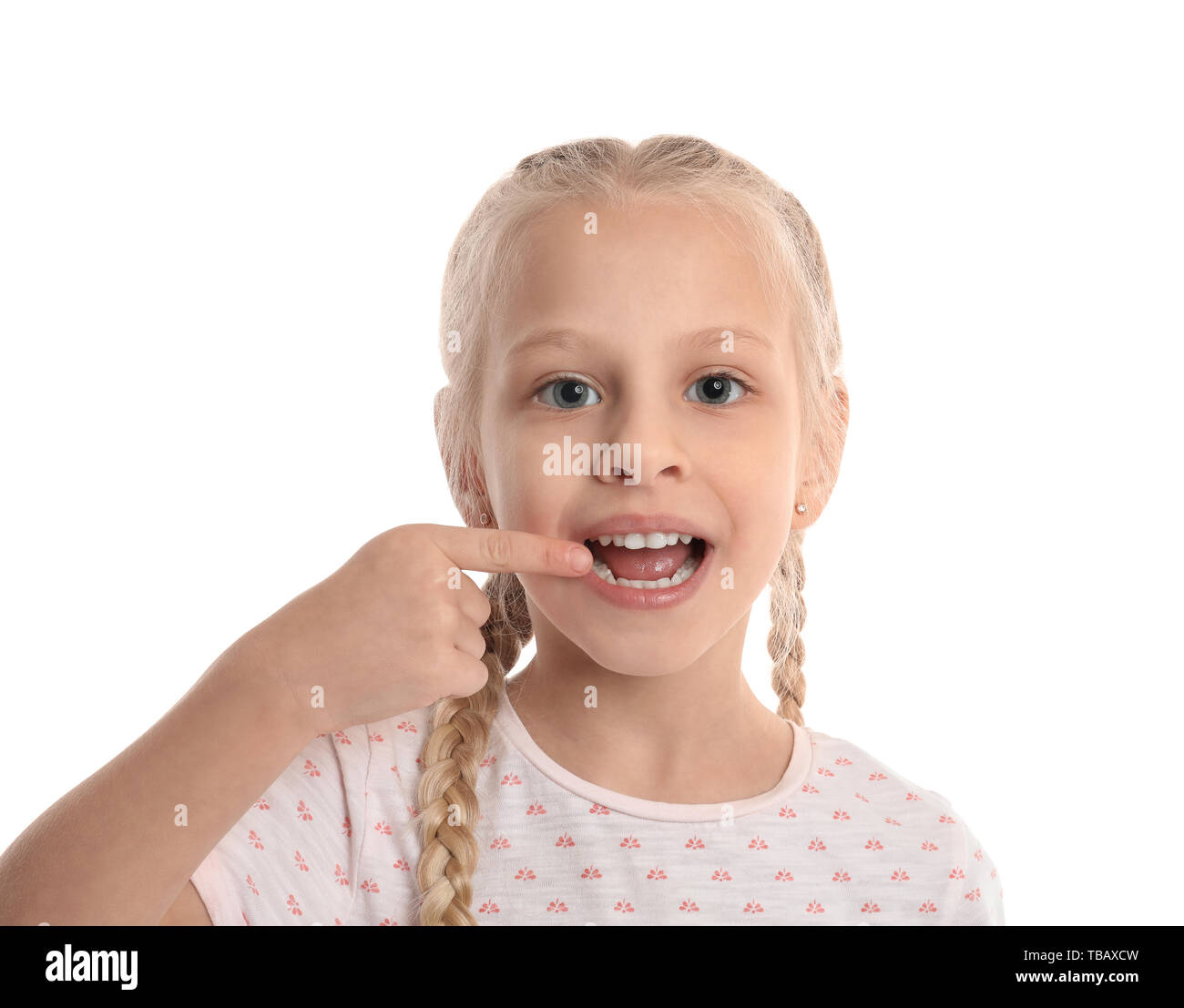 Little girl training pronounce letters on white background Stock Photo