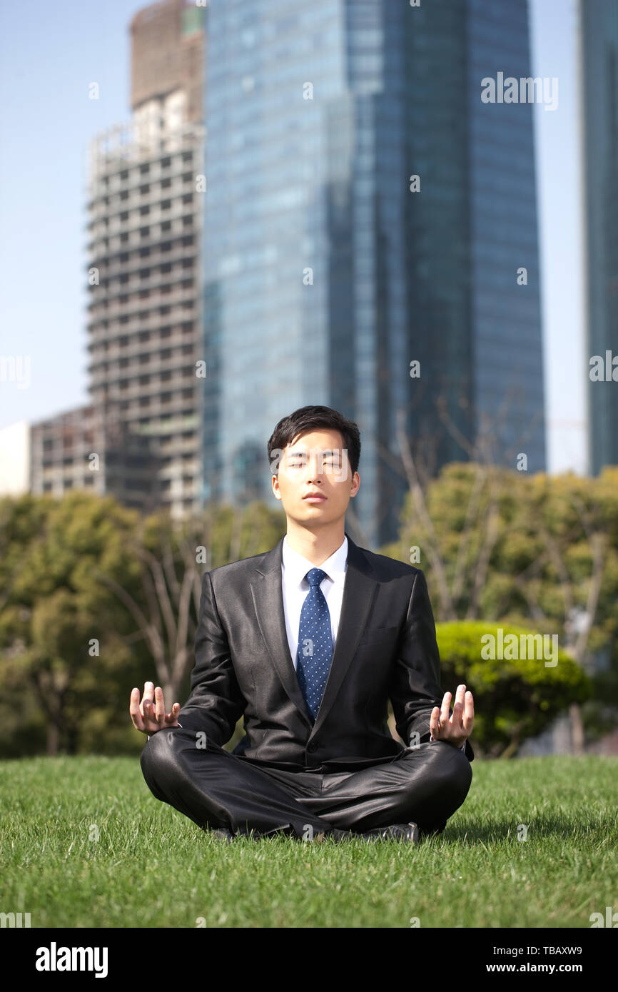 Business people practice yoga outdoors Stock Photo - Alamy