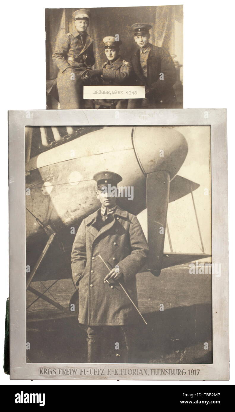 Friedrich-Karl Florian (1894 - 1975) - silver frame with picture of Florian as a fighter pilot The frame engraved 'KRGS FREIW. FL-Uffz. F.K. FLORIAN, FLENSBURG 1917', the back with green velvet and stand, struck with maker's mark 'Raymond Sterling'. The picture shows Florian as a 23-year-old NCO in front of a biplane. Size 20 x 25 cm. historic, historical, 20th century, 1930s, NS, National Socialism, Nazism, Third Reich, German Reich, Germany, German, National Socialist, Nazi, Nazi period, fascism, Editorial-Use-Only Stock Photo