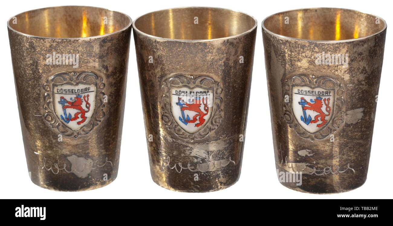 Friedrich-Karl Florian - six silver liquor cups Silver, with applied, enamelled coat of arms of the city of Düsseldorf surmounting Florian's signature, the bottom struck with '800' in a blue presentation case. Weight each 31 g. Height 4.5 cm. The cups were most likely intended as an honour gift from Florian to distinguished Düsseldorf citizens. historic, historical, 20th century, 1930s, NS, National Socialism, Nazism, Third Reich, German Reich, Germany, German, National Socialist, Nazi, Nazi period, fascism, Editorial-Use-Only Stock Photo