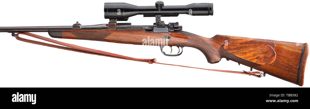 A repeating rifle Mauser Mod. 98, engraved 'Mit Waidmannsheil/Hermann Göring' Cal..243 Win, no. 114870. Manufactured circa 1933/34. Contemporary proof mark on action and lock. Barrel, action and lock with proof mark 1972, Federal Republic of Germany. Stock with chequering. Adjustable cheek-piece. German hair trigger. Additional safety above trigger on left-hand side. On left side of action inscribed 'Mauser-Werke A.G. Oberndorf A/N'. Mauser barrel on receiver head. Magazine plate cover engraved 'Mit Waidmannsheil', underneath facsimile signature , Additional-Rights-Clearance-Info-Not-Available Stock Photo