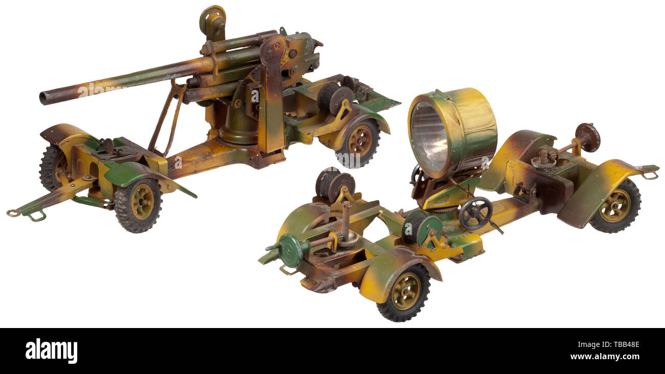 TOYS, TIN TOYS, FIGURES, 8,8 cm-Flak and searchlight with limbers, tin model, by Lineol in three colour camouflage, Editorial-Use-Only Stock Photo