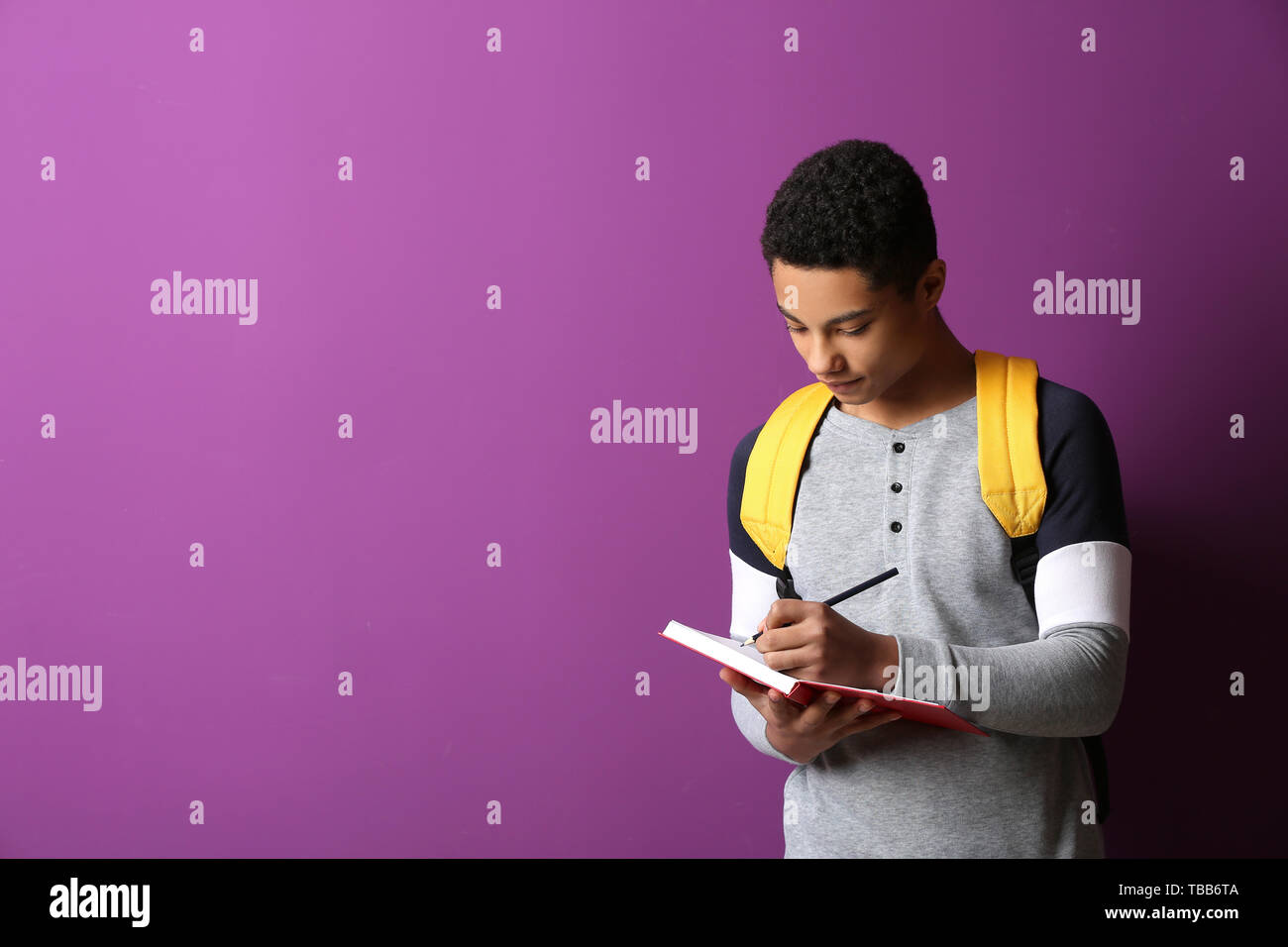 African American Teen Boy Writing High Resolution Stock Photography and ...
