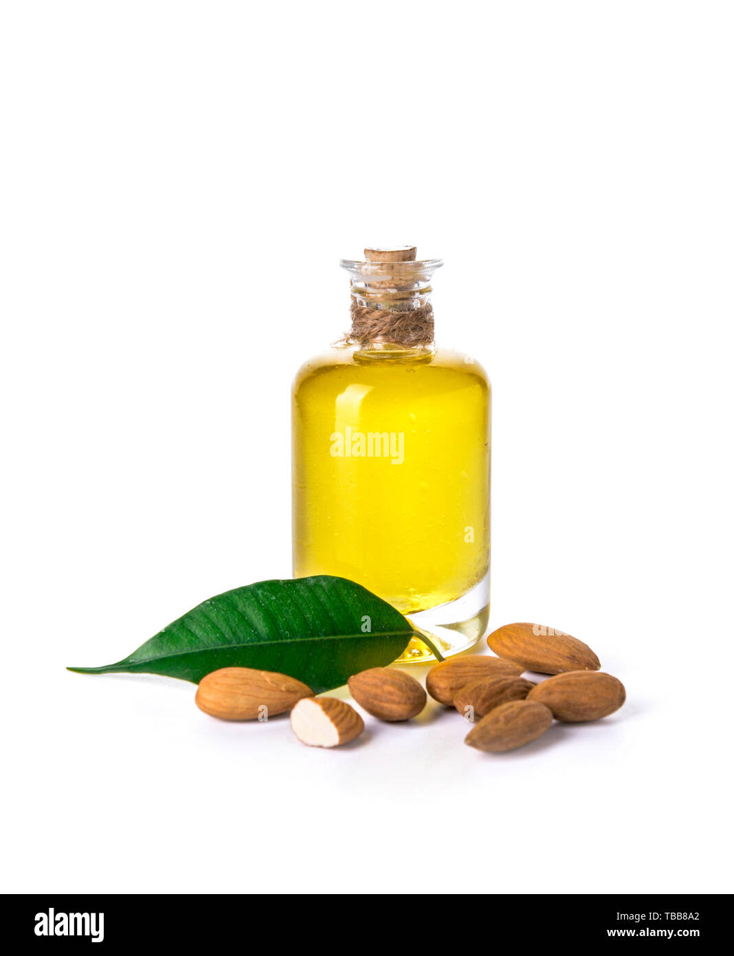 Bottle of almond oil on white background Stock Photo Alamy