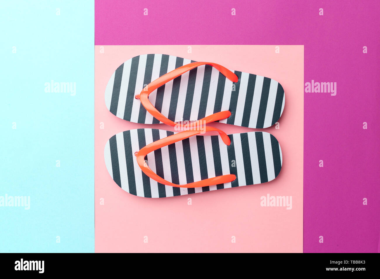 Female flip flops on a colorful vibrant background Stock Photo - Alamy