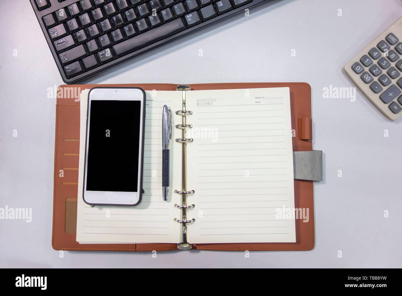 Books, pens, keyboards and calculators on your desk Stock Photo Alamy
