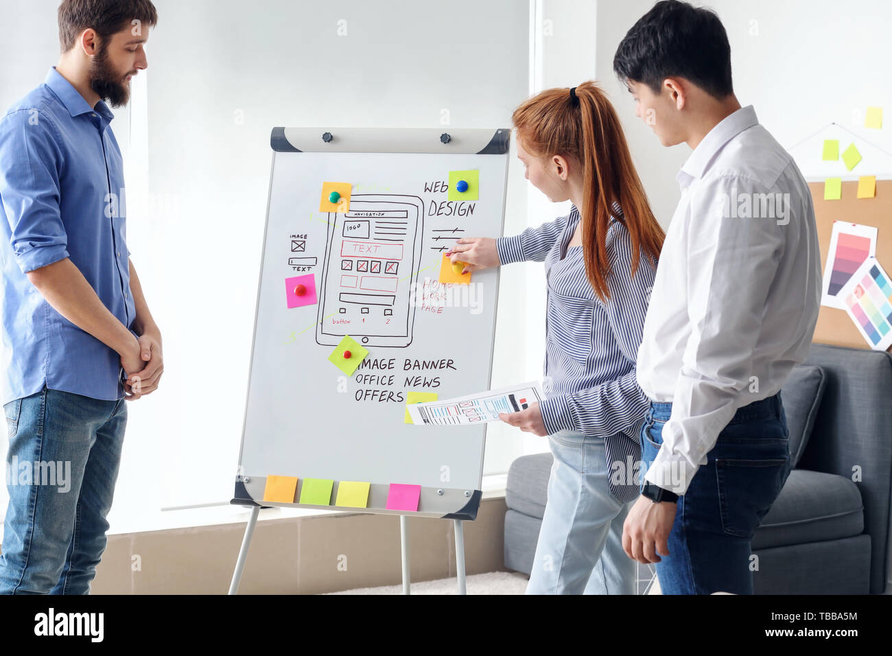 Young IT designers working in office Stock Photo