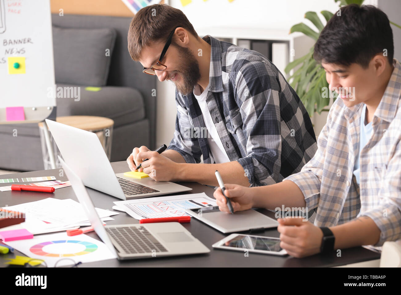 Young IT designers working in office Stock Photo