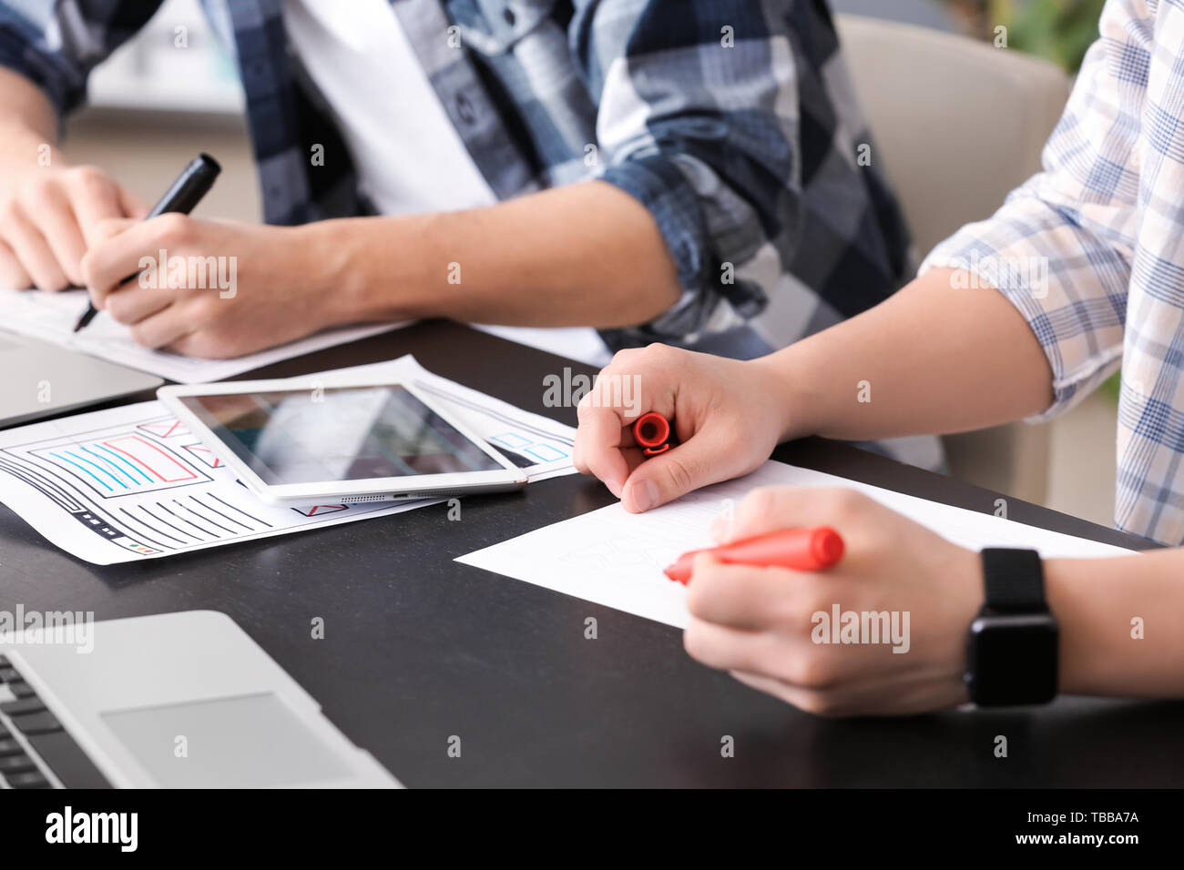 Young IT designers working in office Stock Photo