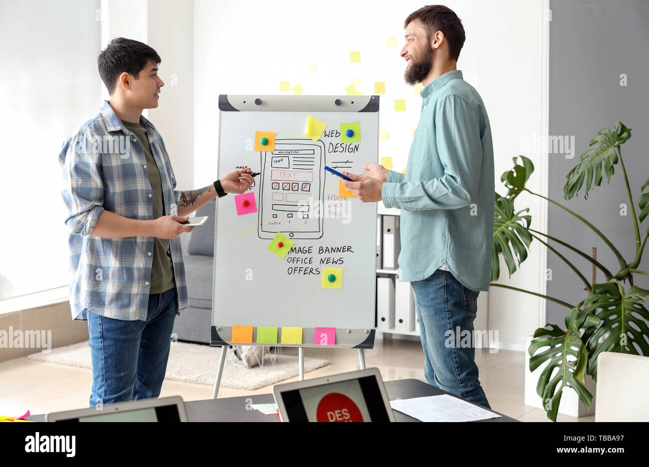 Young IT designers working in office Stock Photo