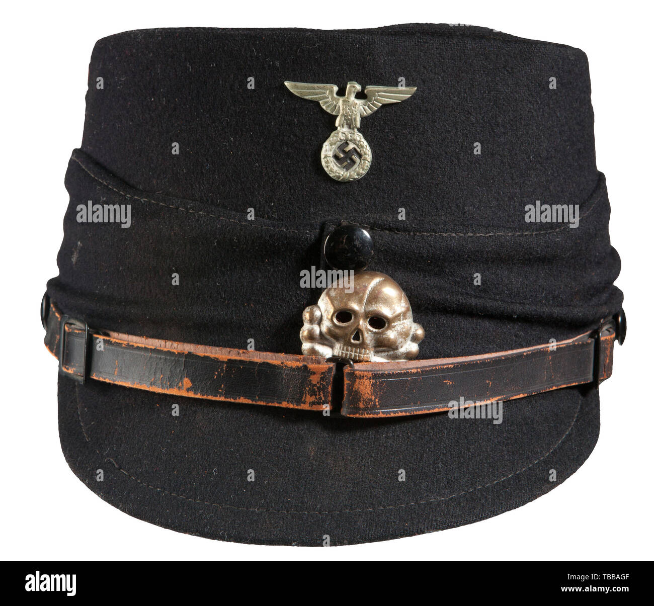 THE JOHN PEPERA COLLECTION, A Kepi for NCO/EM of the Allgemeine SS, So-called 'Traditionsmütze' (tr. 'traditional cap'). Black wool body, band and visor, early, silvered cap insignia (skull attachment prongs missing), black leather, three piece chinstrap. Black linen lining with imprinted golden SS runes in a circle on intact moisture shield. Heavily damaged and missing leather sweatband with RZM tag., Editorial-Use-Only Stock Photo