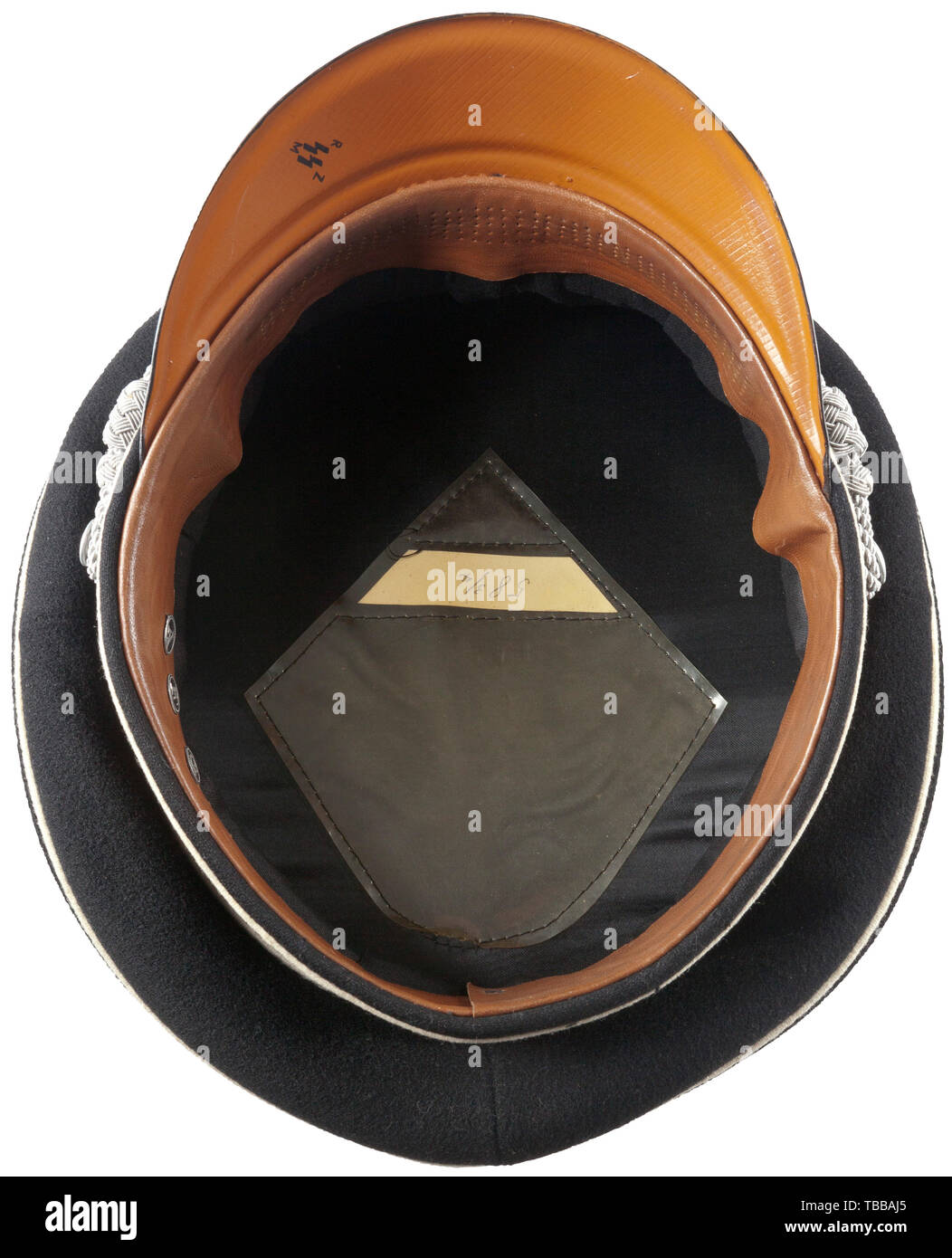 THE JOHN PEPERA COLLECTION, A Visor Hat for Officers of the Allgemeine SS, Fine black wool top, black velvet centre band, white wool piping. Silvered insignia, aluminium chin cords retained by aluminium pebbled side buttons, black lacquered visor, underside stamped with 'SS RZM'. Black silk lining, intact moisture shield, paper size tag with penciled size '58 3/4'. Black 'TUCHMÜTZE' oil cloth RZM tag under brown leather sweatband with initials 'A','F' and 'G' individually attached., Editorial-Use-Only Stock Photo