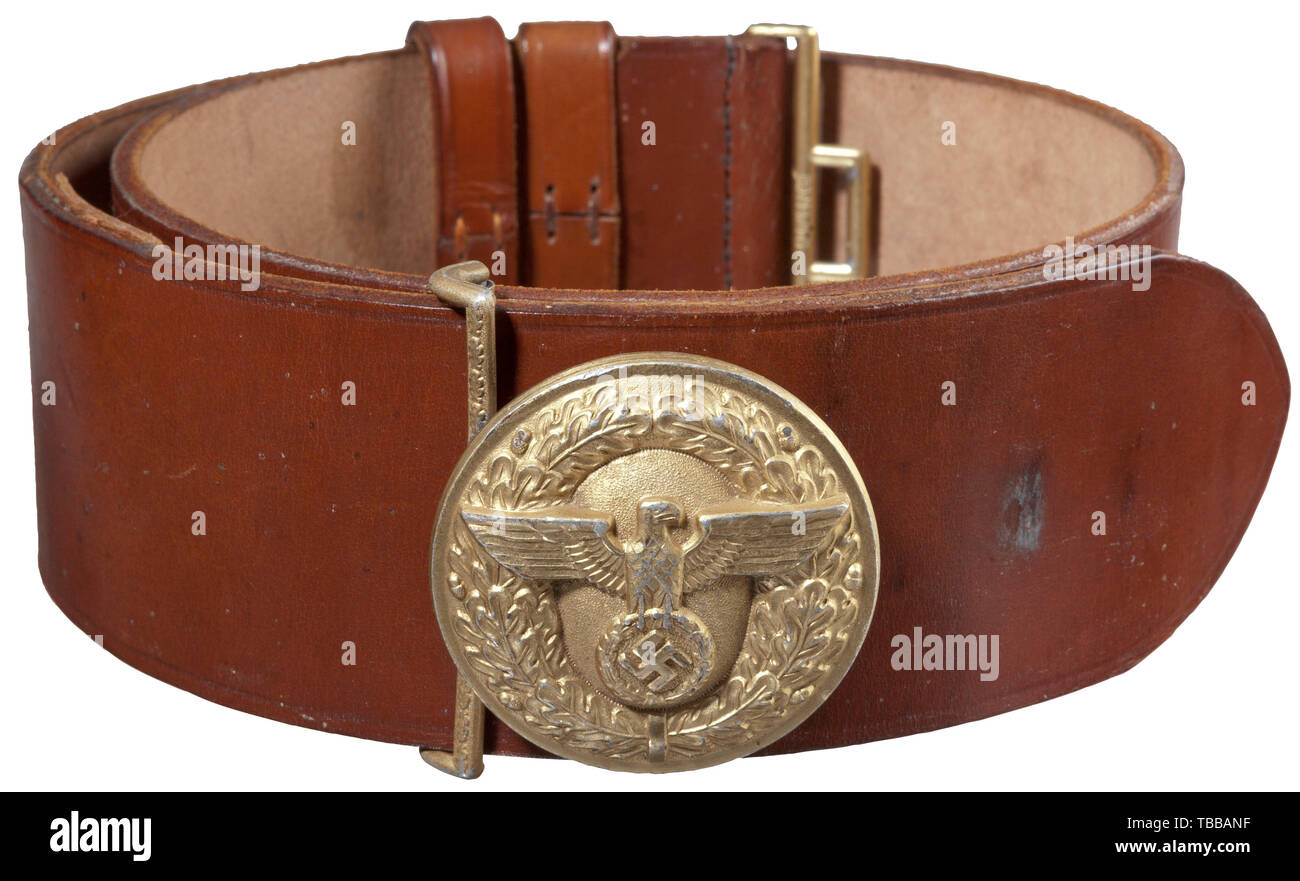 THE JOHN PEPERA COLLECTION, A NSDAP Official Leather Belt and Buckle, Stamped aluminium 57 mm diameter buckle retains 95% gold wash. Reverse has raised manufacturer's code 'RZM (double circle) M4/116'. 60 mm brown leather belt with gilt aluminium catch stamped 'RZM (double circle) M4/46'. Belt is complete with two sliding, vertical 15 mm brown leather keepers and size adjustment tongue. Length approx. 90 mm., Editorial-Use-Only Stock Photo