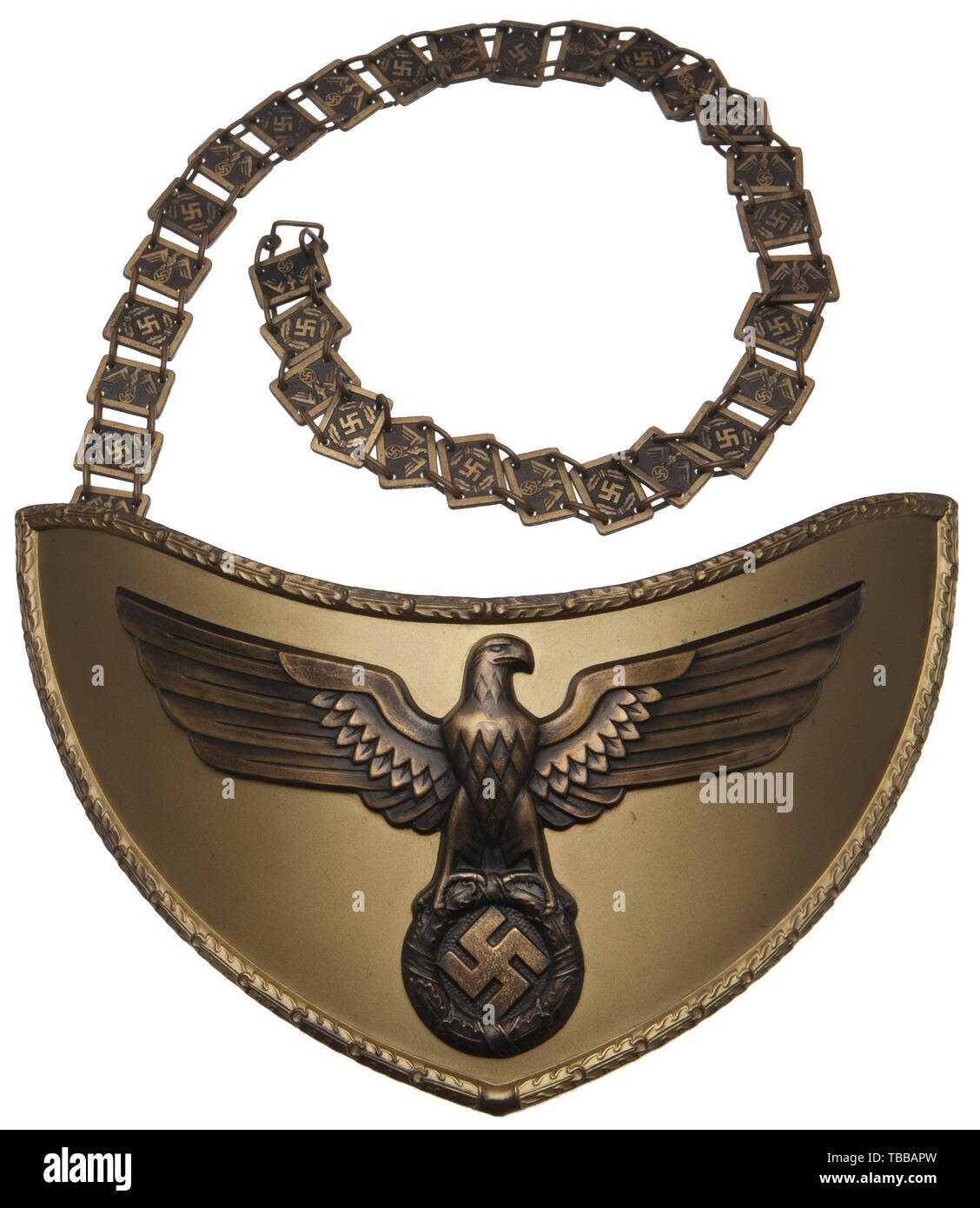 THE JOHN PEPERA COLLECTION, A Gorget for NSDAP Flag Bearer, Gold anodised kidney shaped aluminium plate with oakleaf edging and burnished eagle. Reverse covered in bright green wool complete with two chain clips each stamped 'RZM (double circle) M/14'. The gold anodised and burnished aluminium neck chain consists of alternating links with national eagles and swastikas. The first and last link each are stamped 'RZM (double circle) M/14'. Complete with heavily damaged storage box., Editorial-Use-Only Stock Photo