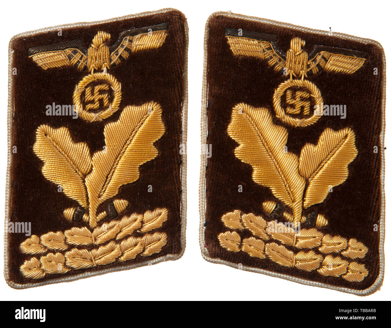 THE JOHN PEPERA COLLECTION, A Pair of Collar Tabs for NSDAP Kreisleitung Hauptbereichsleiter, Light brown velvet on buckram backing, outer edges trimmed in white rayon piping with paper RZM tag. Tabs feature cellon embroidered national eagle above two oak leaves above two horizontal oak leaf bars in matching construction all with gold wire thread highlights., Editorial-Use-Only Stock Photo