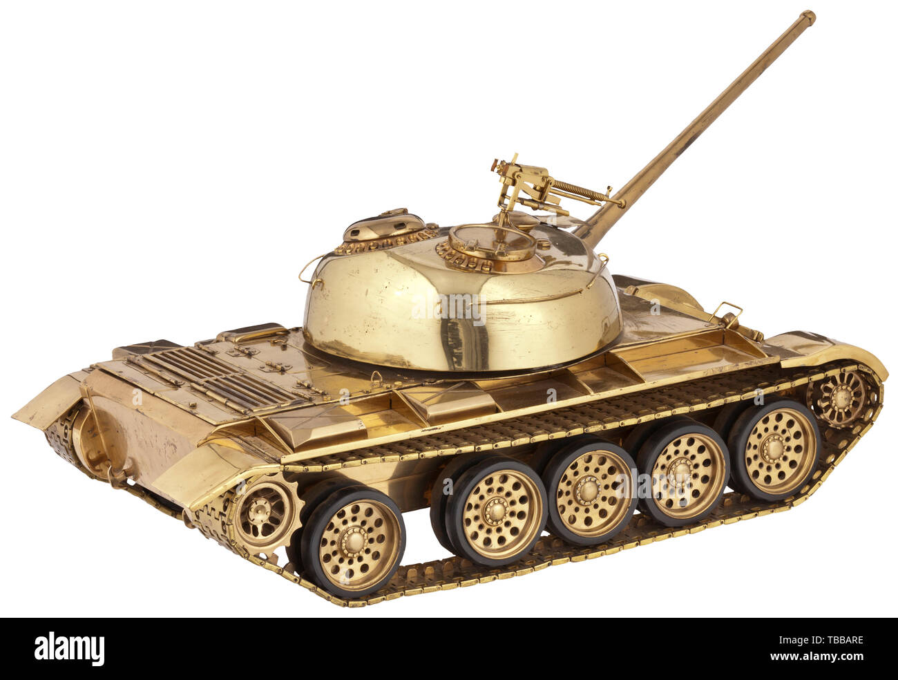 A large T 54/55 tank model as a jubilee gift of the Soviet Forces in Germany, from the year 1958, Brass, shining like gold, polished and varnished. Rotatable turret with vertically movable cannon and flak machine gun, movable tracks (rubber coating), movable rear hoods and track covers. Plaque on chassis with engraved Cyrillic dedication (tr.) 'For the soldats of the National People's Army (NVA) of the GDR from the Group of Soviet Forces in Germany (GSSD) to the two-year anniversary of the NVA'. Rubbed in places, few little screws on hoods missing (replaceable). Dimensions , Editorial-Use-Only Stock Photo