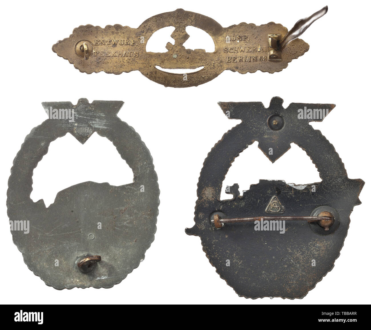 Speedboat war badges and a U-Boat Combat Clasp - three examples, S-boat war badge of first model with small boat (type S-30) made of zinc by Steinhauer & Lück in Lüdenscheid. Massively moulded, lightly convex example in initial form with so-called ring identification. Pin hinge missing, gilding etc. migrated. Width 44.2 mm. Weight 29.5 g. A further badge of 2nd model showing type S-38 (large boat) made of zinc by the firm Adolf Scholze with known triangular firm logo, in good condition. Pin rusty, upper safety hook missing. Width 54.5 mm (boat/wave). Weight 32 g. U-boat Com, Editorial-Use-Only Stock Photo