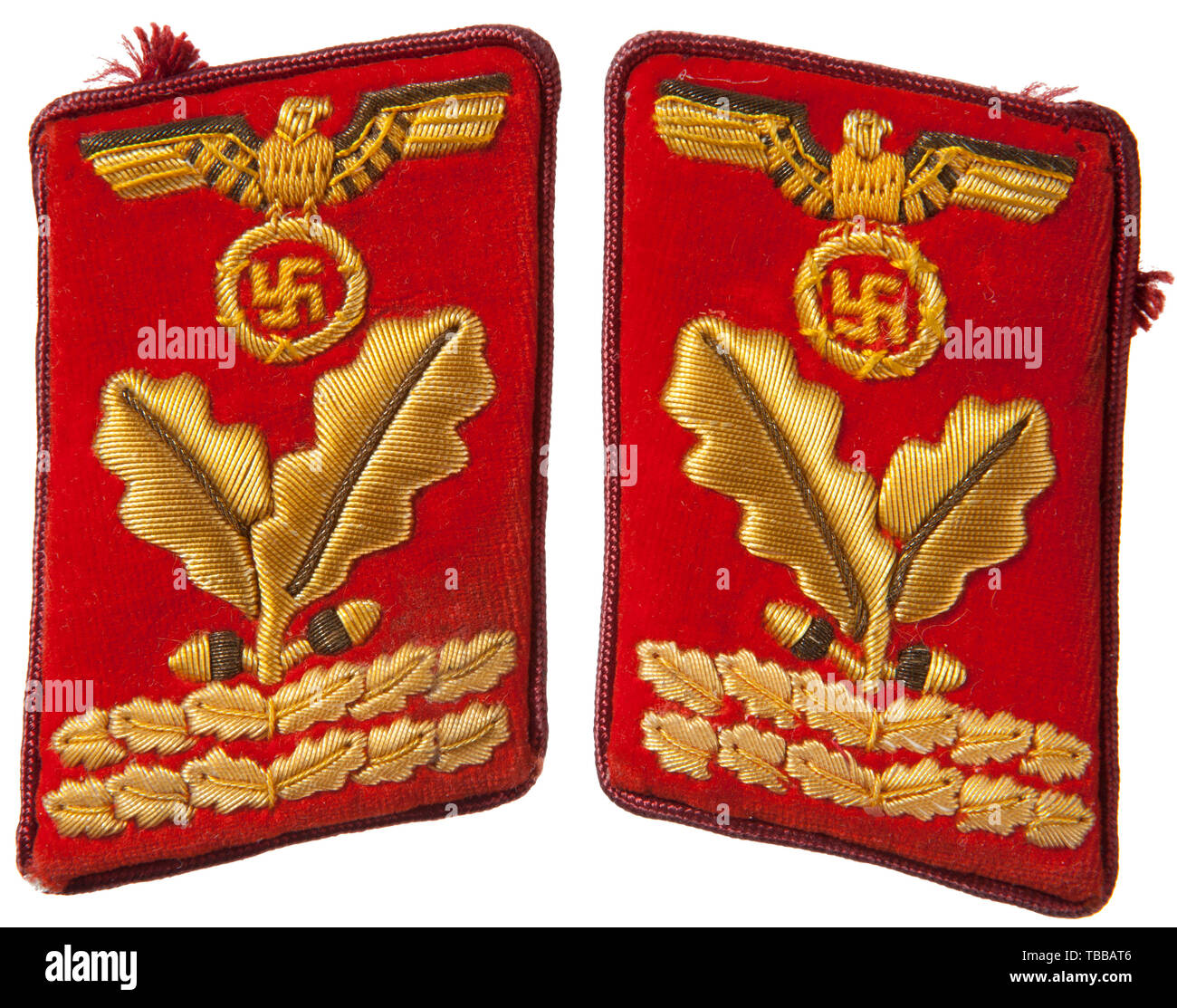 THE JOHN PEPERA COLLECTION, A Pair of Collar Tabs for NSDAP Gauleitung Hauptbereichsleiter, Red velvet on buckram backing, outer edges trimmed in dark red rayon piping with paper RZM tag. Tabs feature cellon embroidered national eagle above two oak leaves above two horizontal oak leaf bars in matching construction all with gold wire thread highlights., Editorial-Use-Only Stock Photo