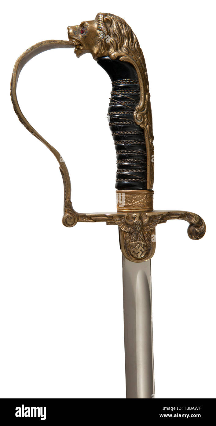 THE JOHN PEPERA COLLECTION, A Saber for Army Officer, WKC, Solingen, Model No. 1059, Slightly curved plated blade with manufacturer's logo stamped in obverse ricasso. Service worn gilded brass lion head hilt with red glass eyes. Obverse langet depicting national eagle with outstretched wings. Back strap, knuckle bow and ferrule decorated with oakleaf pattern. Black celluloid grip with damaged triple brass wire wrap. Black lacquered steel scabbard retains 85% with bent movable attachment ring. Length 97 cm., Editorial-Use-Only Stock Photo