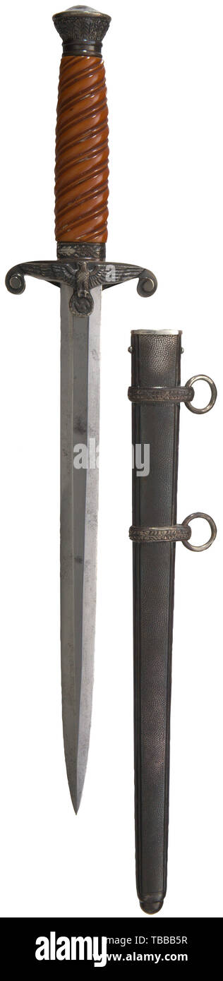 THE JOHN PEPERA COLLECTION, A M 35 Dagger for Army Officer, Maker E. Pack & Söhne, Solingen. Polished blade (spotted) with etched manufacturer's logo. Silver-plated pommel and crossguard (tarnished). Orange-coloured celluloid early slant grip. Silver-plated steel scabbard (tarnished). Length 40 cm., Editorial-Use-Only Stock Photo