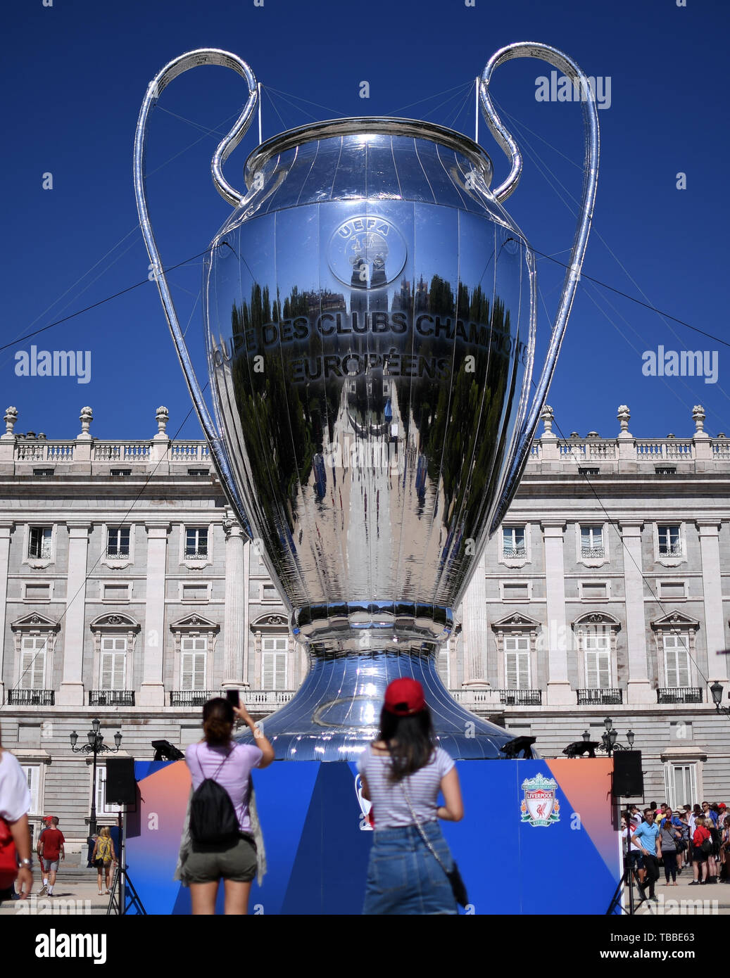 A view of a giant replica Champions League trophy in front of Plaza de  Oriente in Madrid, Spain Stock Photo - Alamy