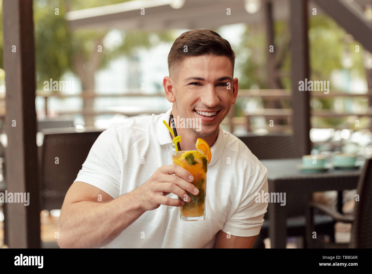 Man drinking cocktail beach hi-res stock photography and images - Alamy