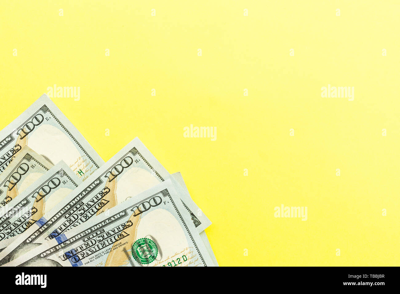 One Hundred Dollar Bills Cash Lying On Yellow Background Financial Concept Flat Lay Mockup Overhead Stock Photo Alamy