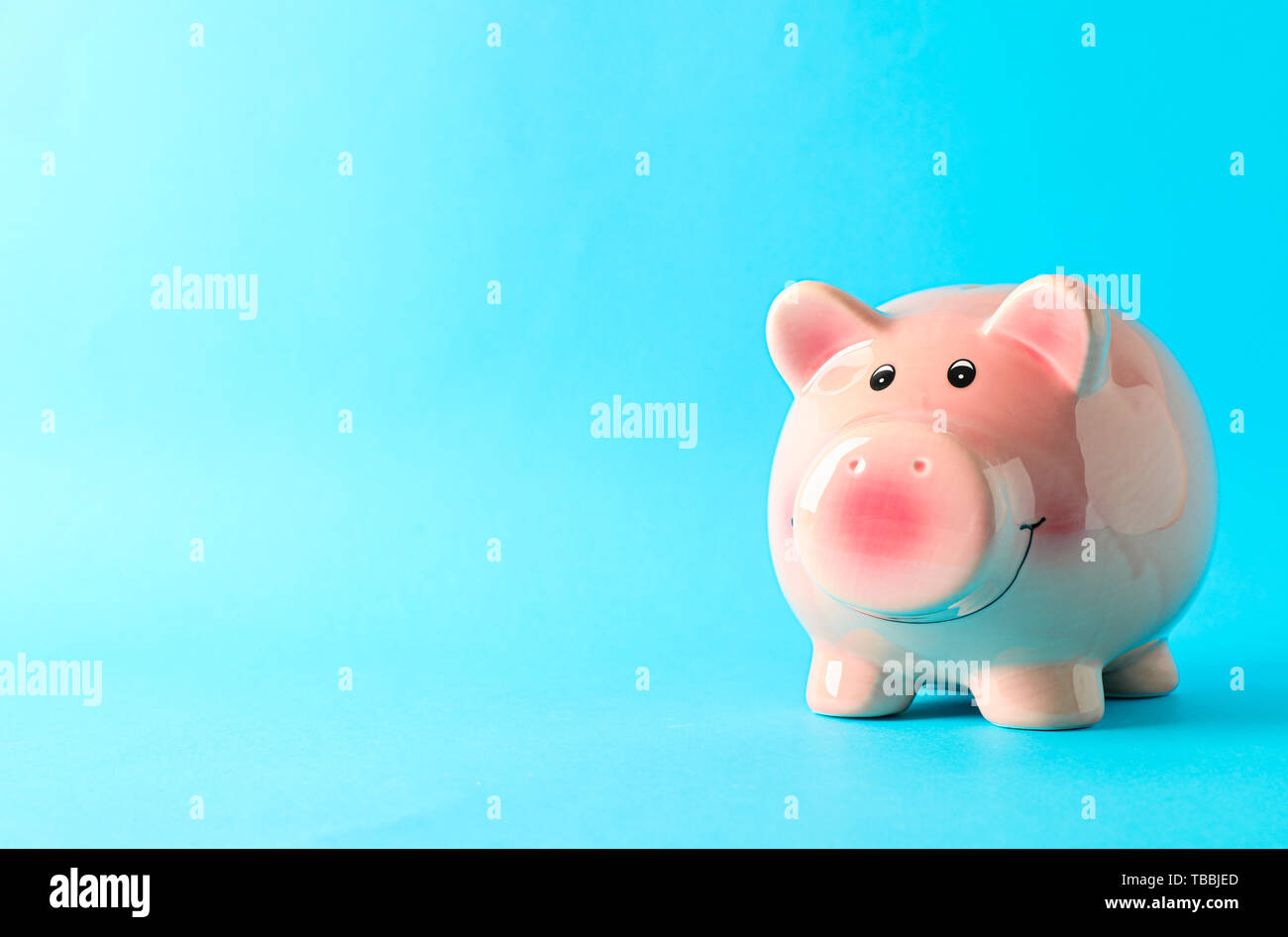 Happy Piggy Bank On Color Background Space For Text Finance