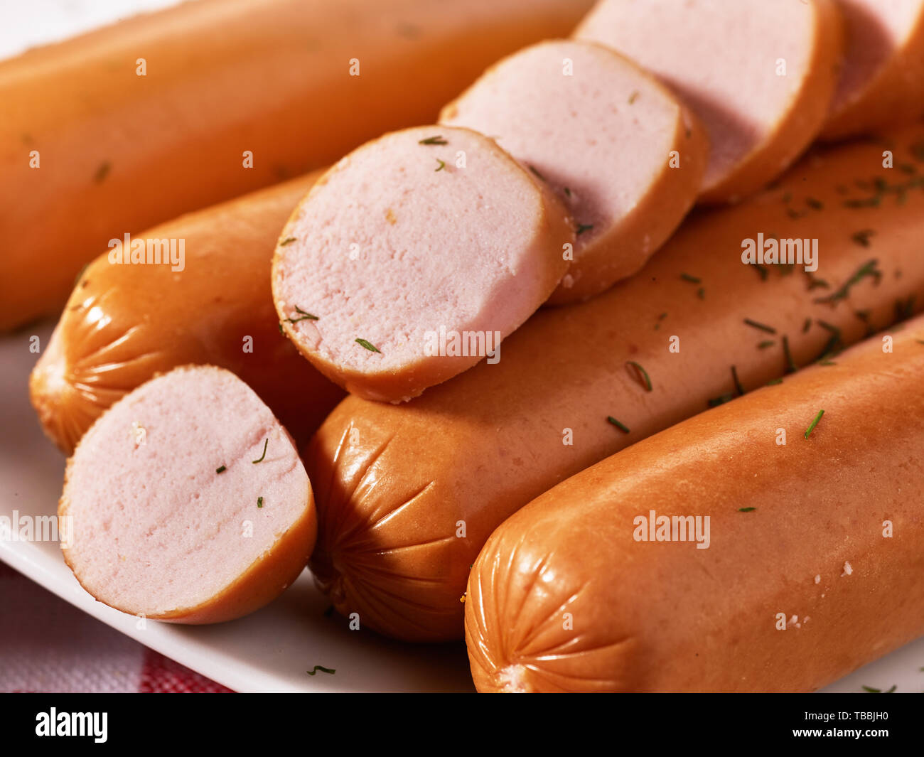 Sausages cut into pieces with spice Stock Photo