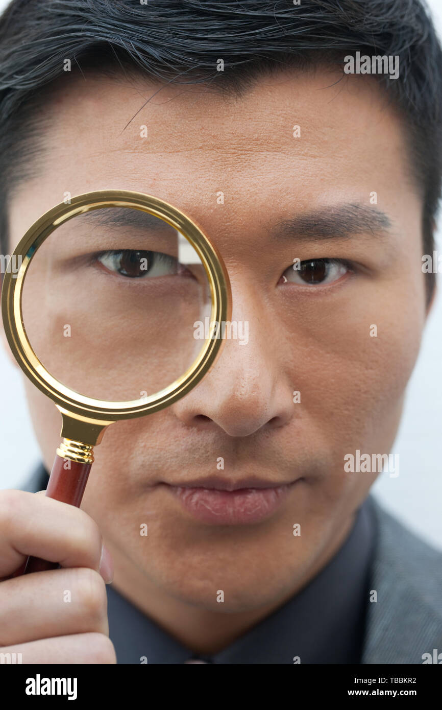 Old man magnifying glass eye hires stock photography and images Alamy