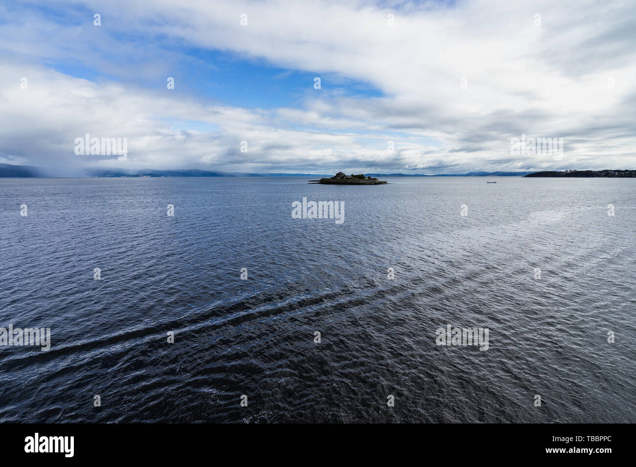 Munkholmen island in Trondheim fjord viewed form cruise ship, Norway Stock Photo