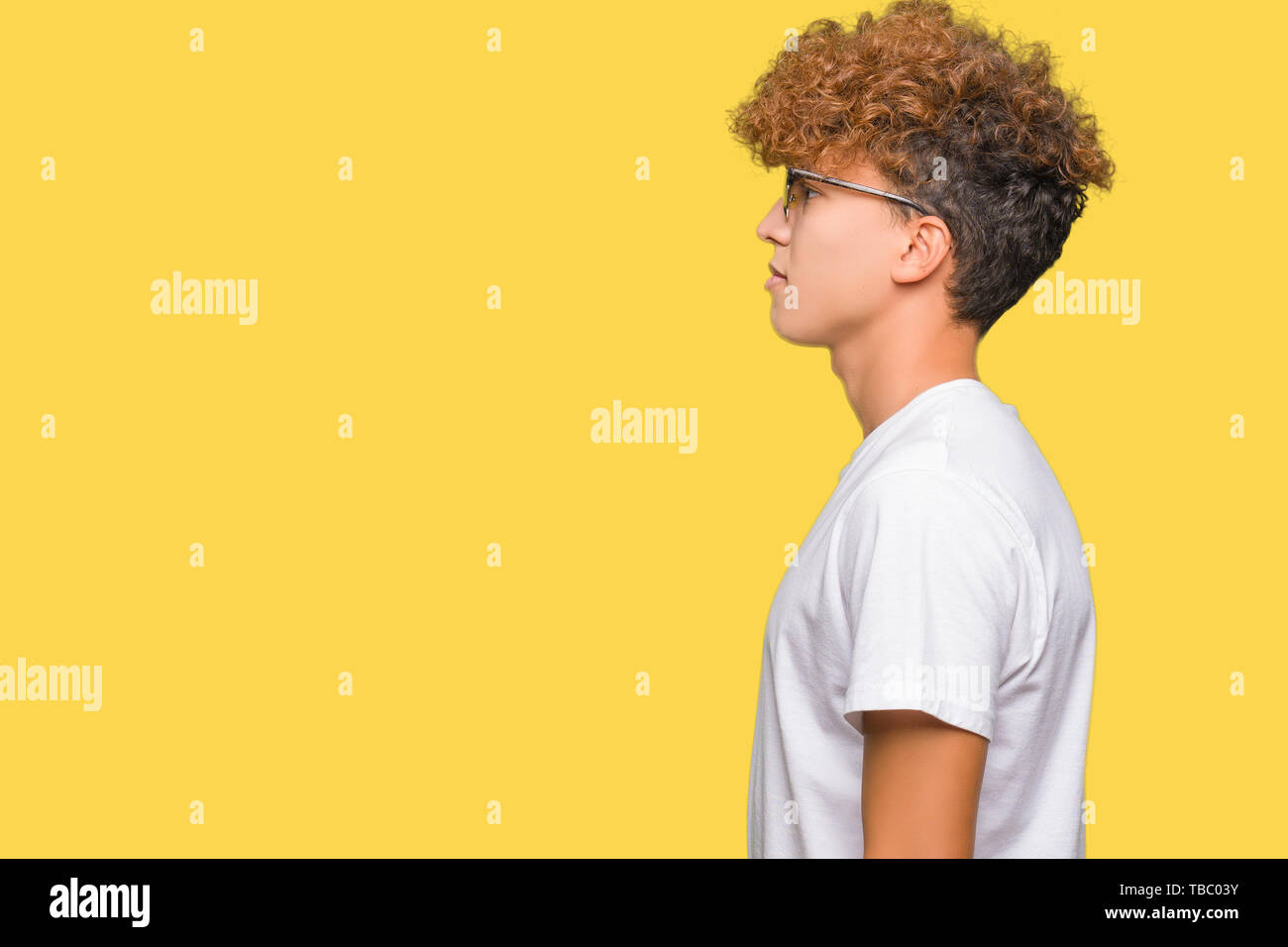 Young Handsome Man With Afro Hair Wearing Sunglasses Looking To