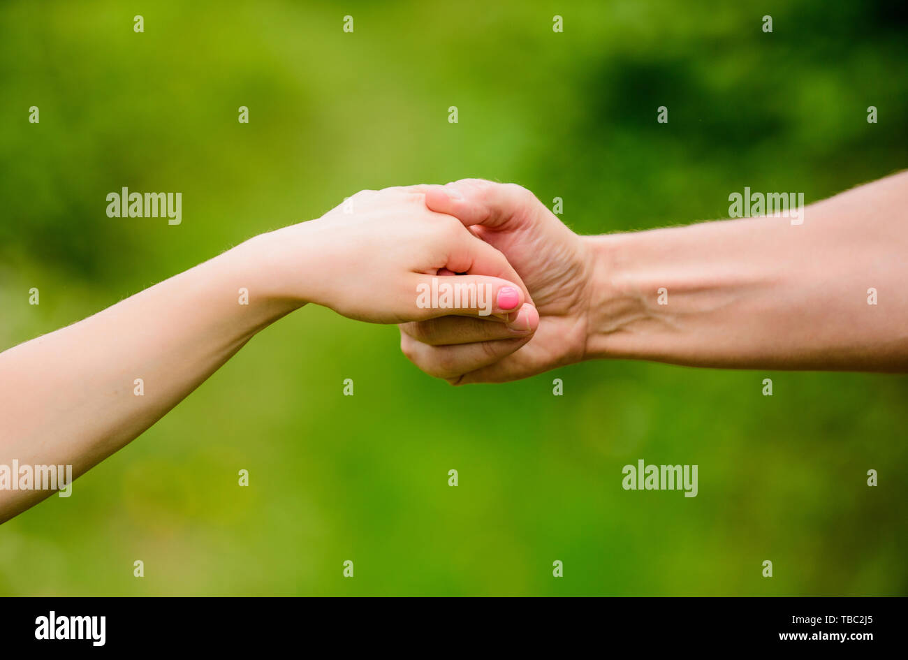 Giving all support to kid. Helpful hand of father. Upbringing and child