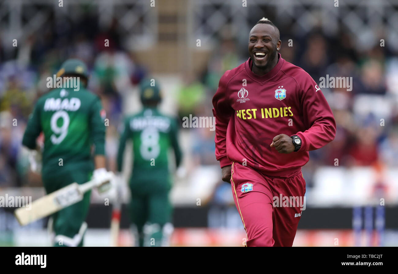 West Indies' Andre Russell celebrates as Pakistan's Imad Wasim walks off after being caught out during the ICC Cricket World Cup group stage match at Trent Bridge, Nottingham. Stock Photo