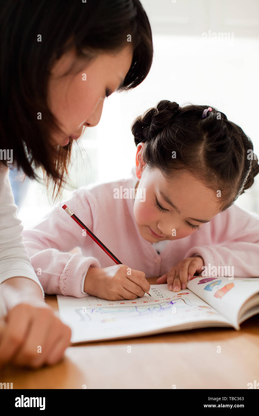 Children writing hi-res stock photography and images - Alamy