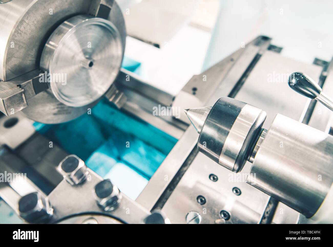 Modern Metal Processing Using Lathe Machine. Closeup Photo