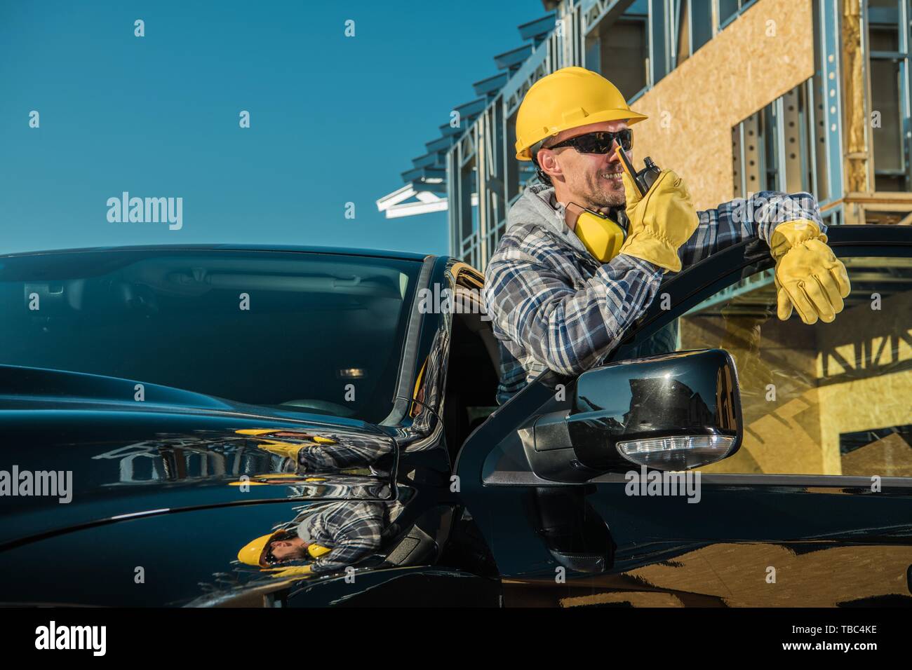 Happy Caucasian Contractor in His 30s Taking Conversation with Crew ...