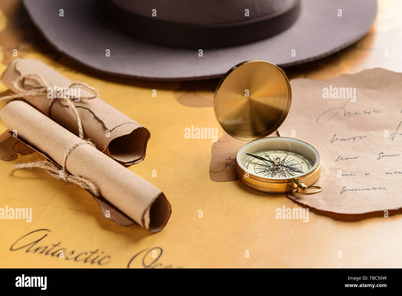 Letters With Compass On Map Stock Photo Alamy