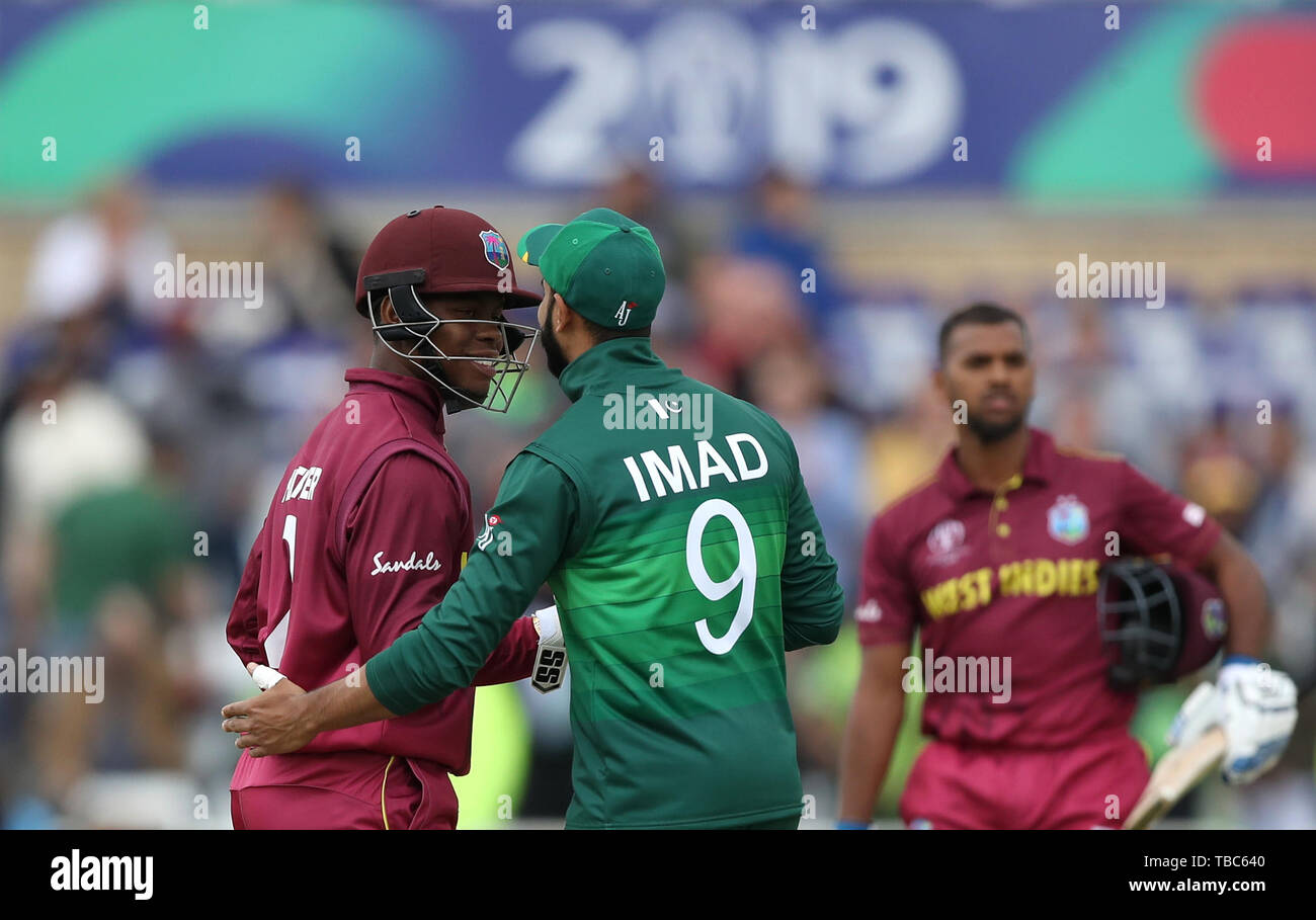 West Indies' Shimron Hetmyer (left) celebrates victory after the ICC Cricket  World Cup group stage match at Trent Bridge, Nottingham Stock Photo - Alamy