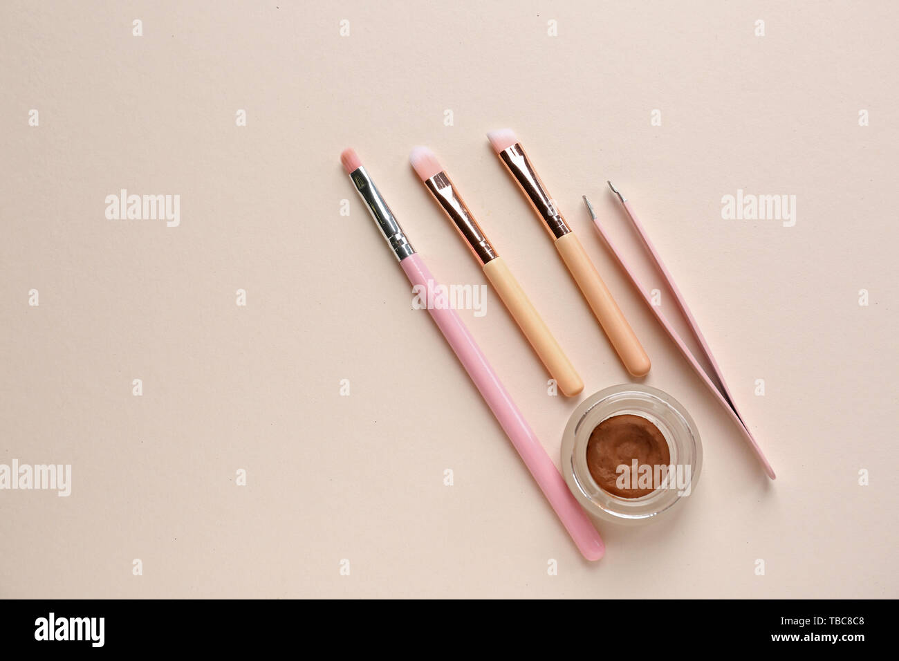 Set of tools for eyebrows correction on light background Stock Photo