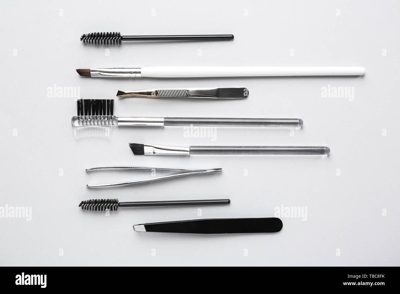 Set of tools for eyebrows correction on white background Stock Photo