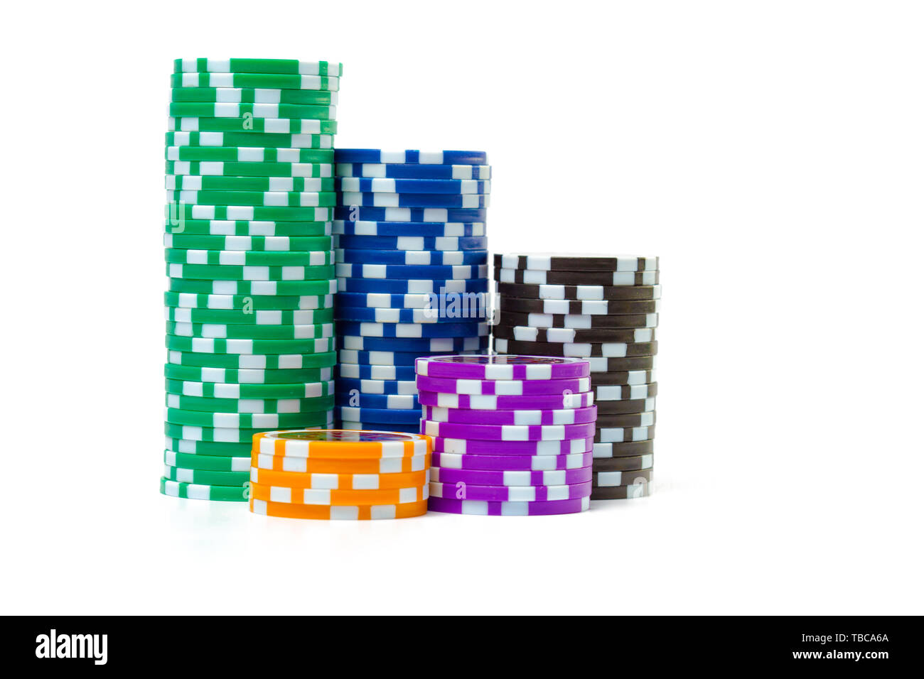 Stacks of poker chips isolated on white background Stock Photo