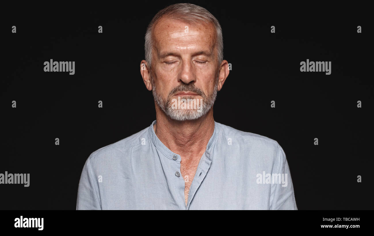 Old man face black background hi-res stock photography and images - Alamy