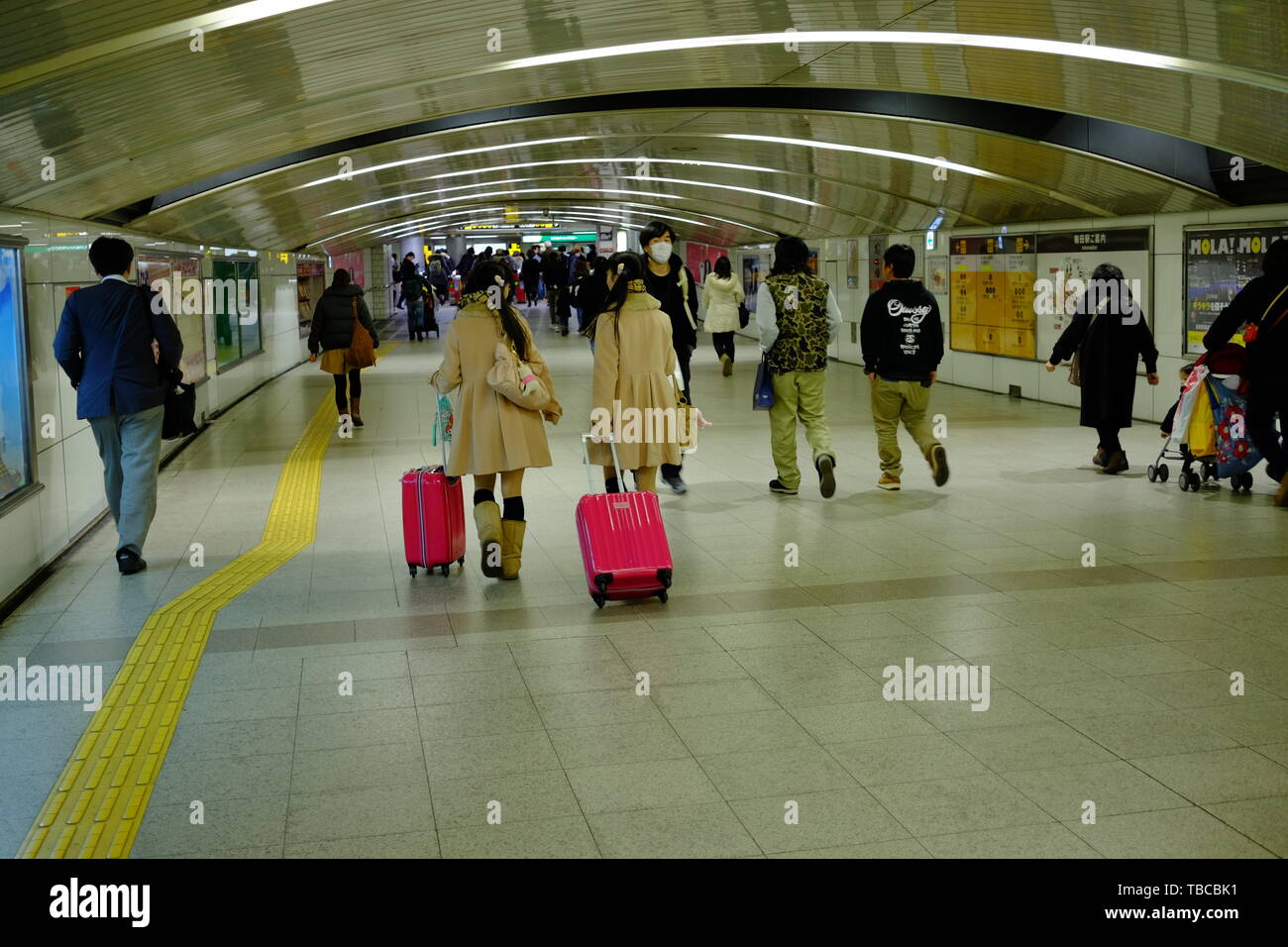 People walking in metro train station in Osaka city Stock Photo