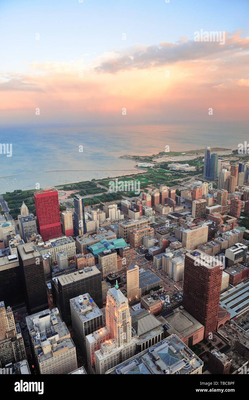 Chicago downtown aerial panorama view at sunset with skyscrapers and city skyline at Michigan lakefront with colorful cloud. Stock Photo