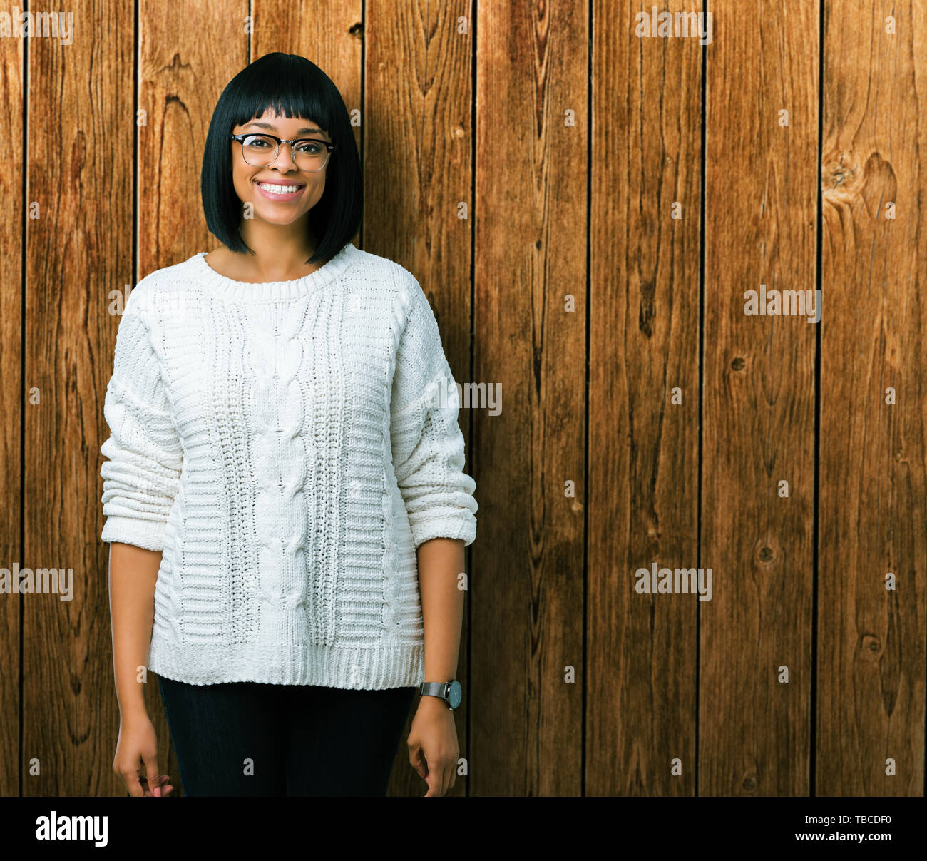 Beautiful young african american woman wearing glasses over isolated ...