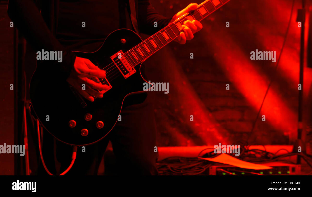 Guitar player on stage Stock Photo Alamy