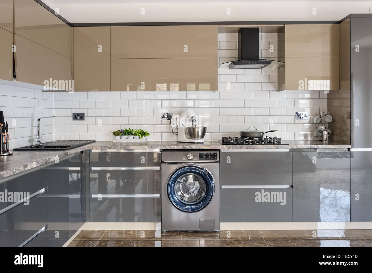 Luxury modern white, beige and grey kitchen interior Stock Photo - Alamy