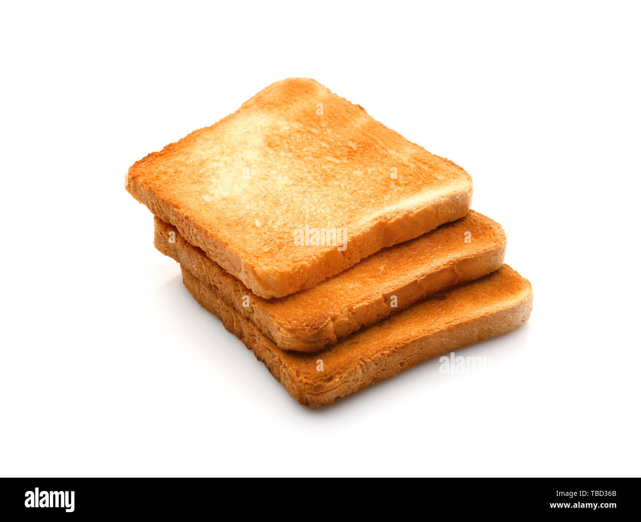 Slices of toasted bread on white background Stock Photo - Alamy