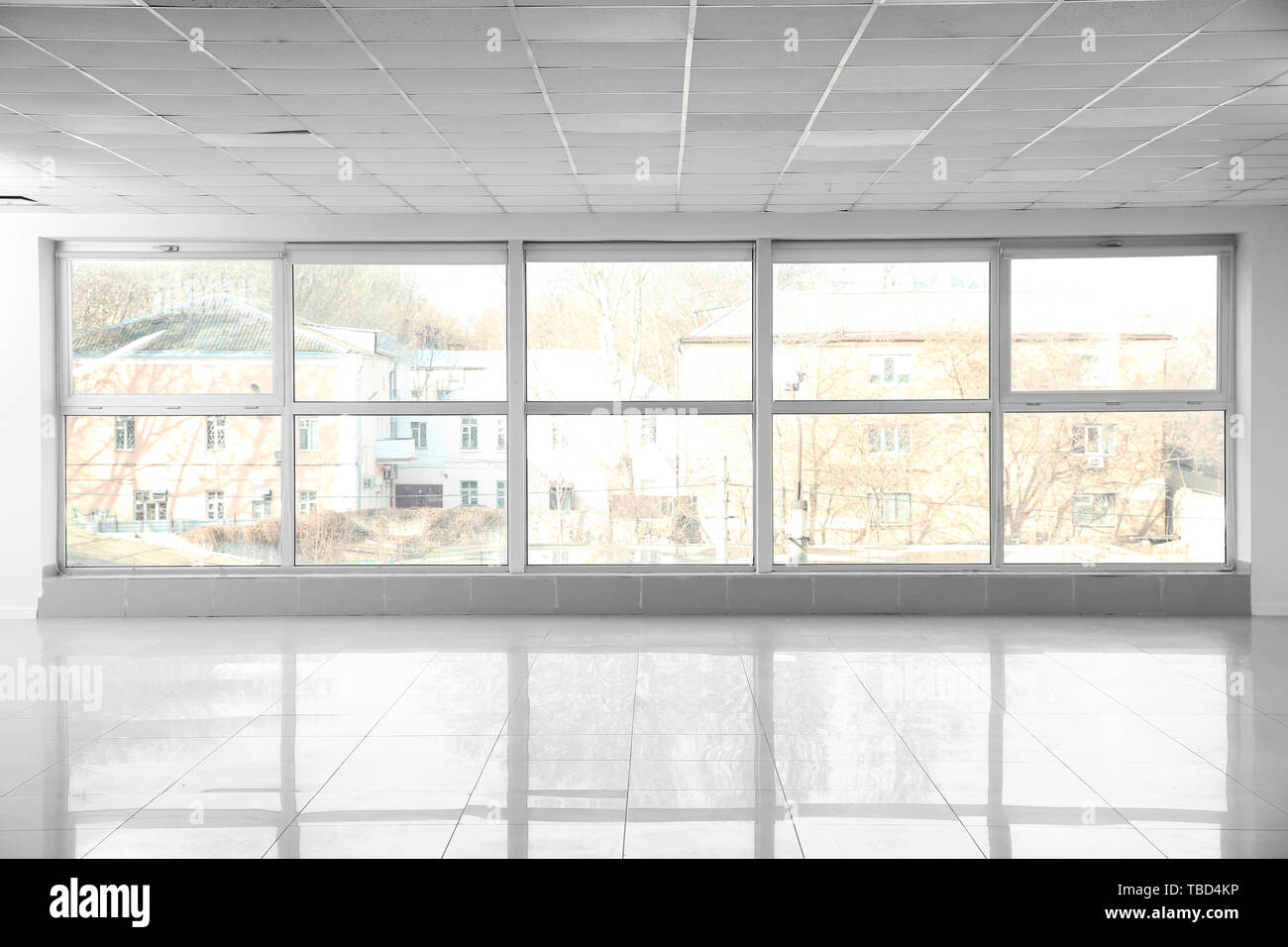 Empty room with big window Stock Photo - Alamy